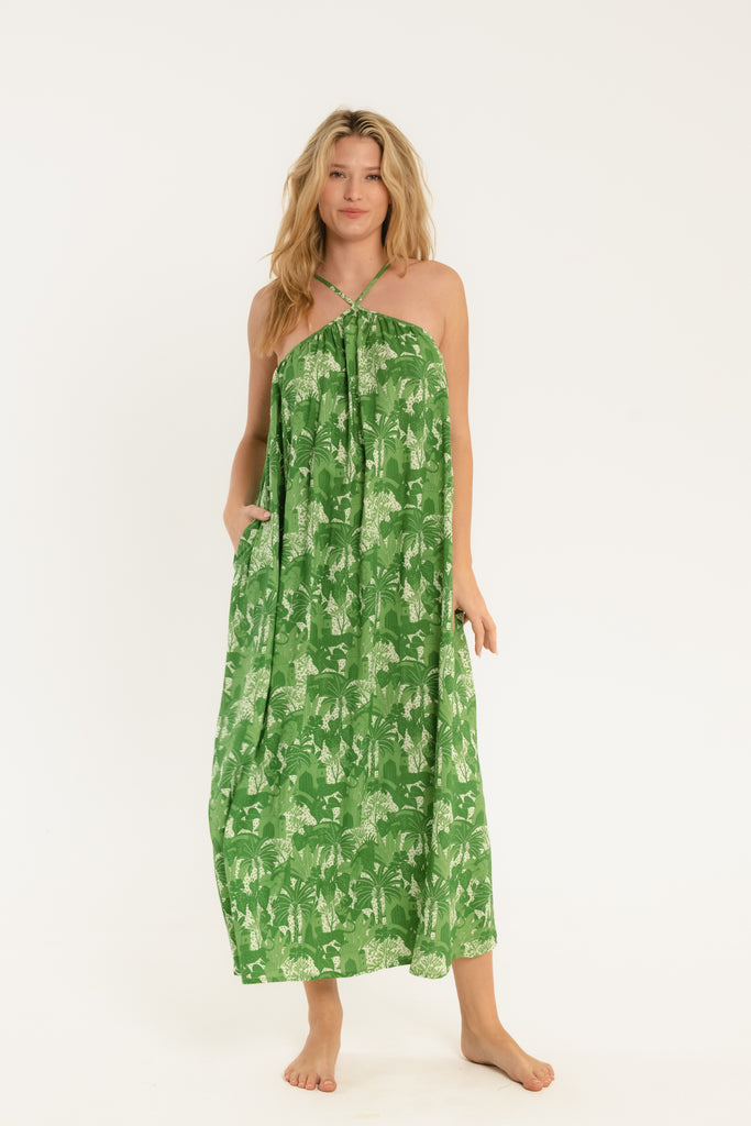 Green tropical printed maxi dress with halter top and thin adjustable straps