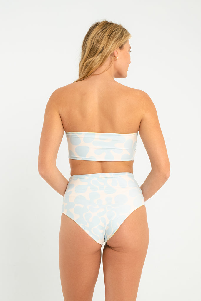 light blue and lime green abstract patterned reversible high waisted full coverage swim bottoms 