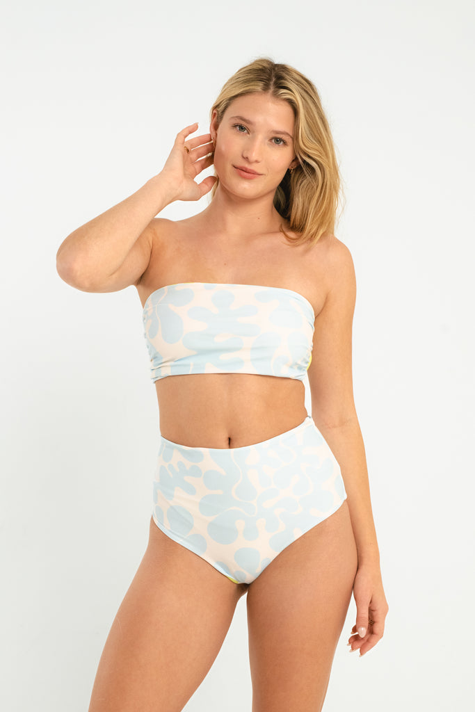 light blue and lime green abstract patterned reversible high waisted full coverage swim bottoms