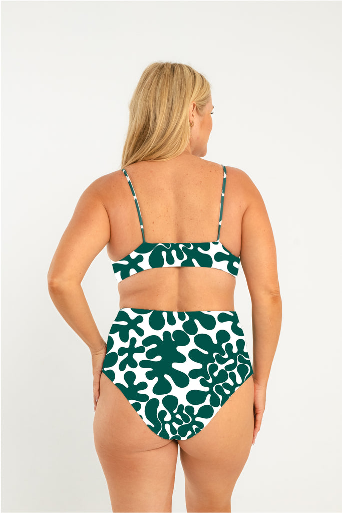 dark green and white abstract printed bralette style bikini top with thin straps
