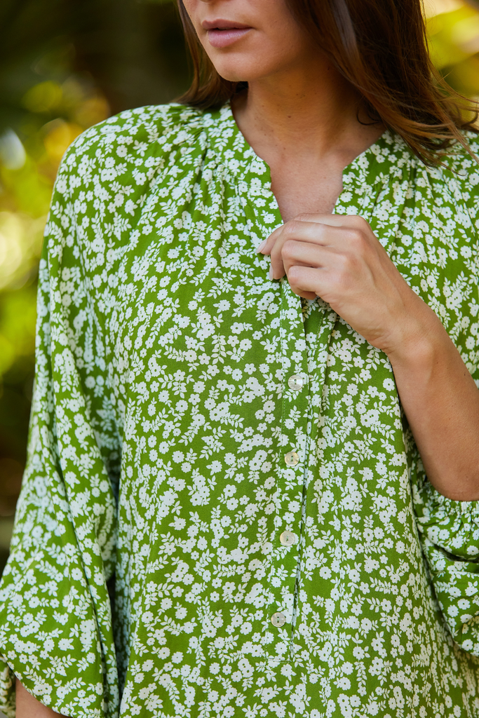 green and white floral printed long sleeve midi dress with vneck 