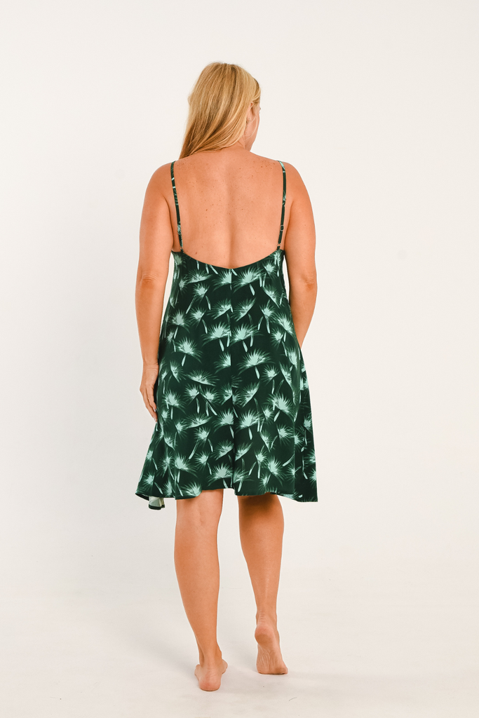 teal palm printed dress with thin straps and above the knee in length