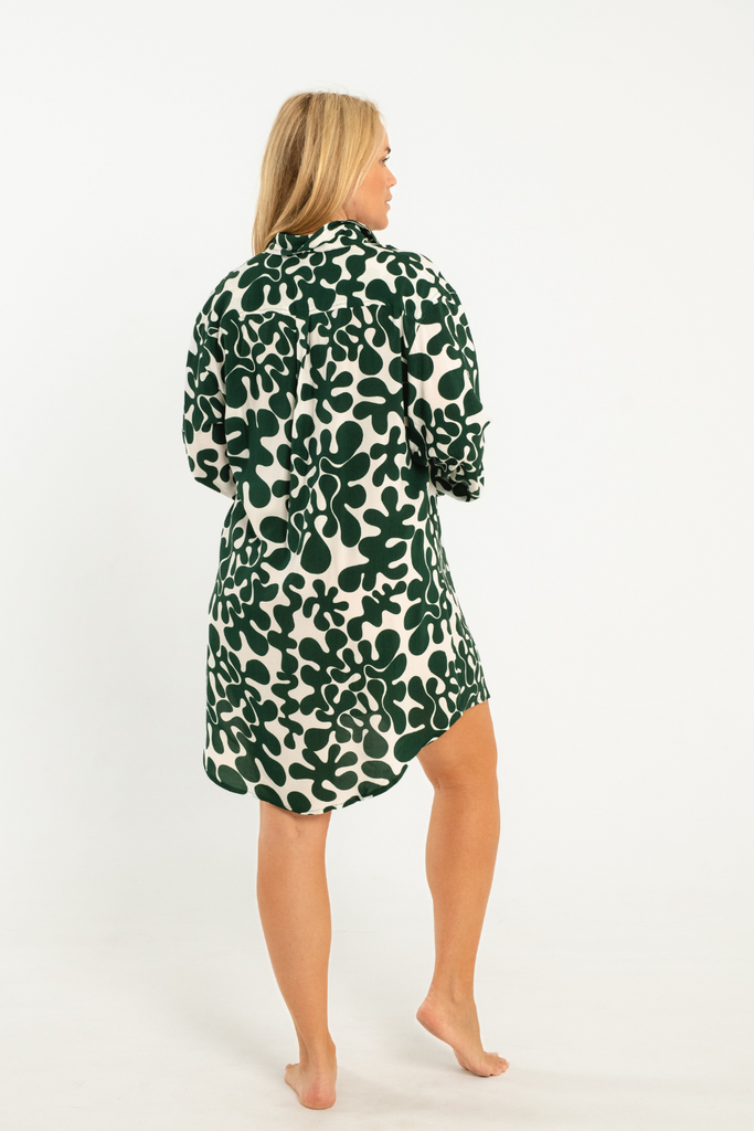 dark green and white abstract printed button up above knee length shirt dress with collar