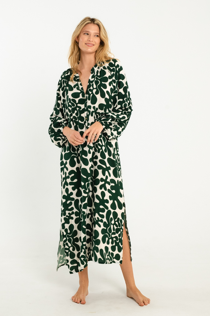 dark green and white abstract printed button up maxi dress with long sleeves