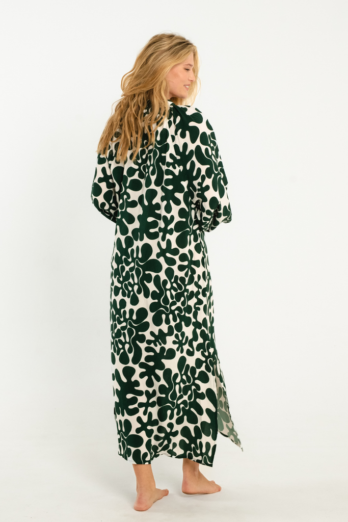 dark green and white abstract printed button up maxi dress with long sleeves